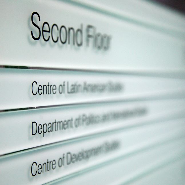 Second floor sign in Alison Richard Building showing Centre of Development Studies