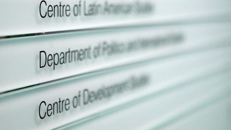 Second floor sign in Alison Richard Building showing Centre of Development Studies